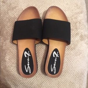 Seven Black Slide Sandals.